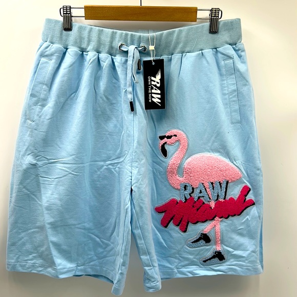 NWT RAW OWN THE NOW MENS GRAPHIC PATCH BLUE PINK MENS 2 POCKET SOFT TOUCH SHORTS - Picture 1 of 8